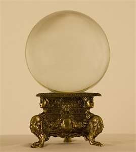 A crystal ball on a stand